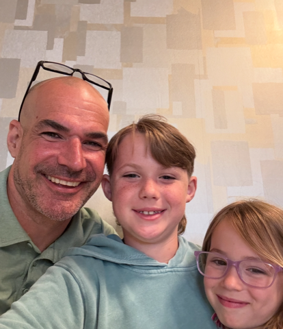 Tom Becher with his children